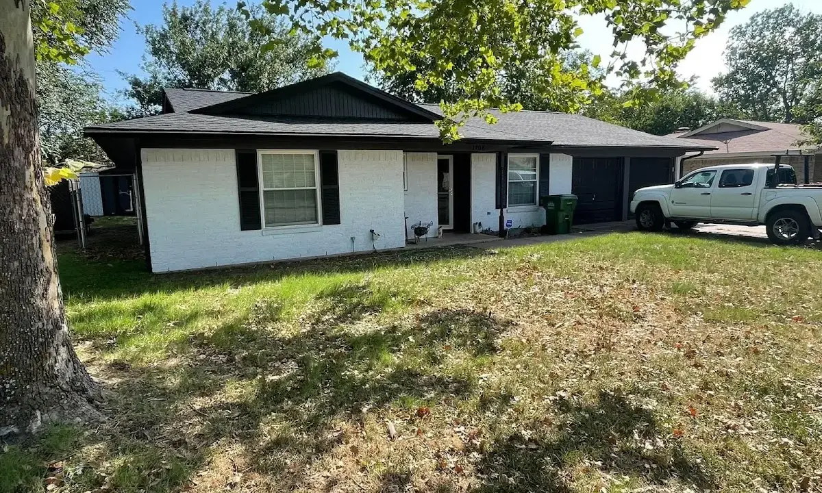 Professional roofing crew working on a residential roof in Bloomsburg